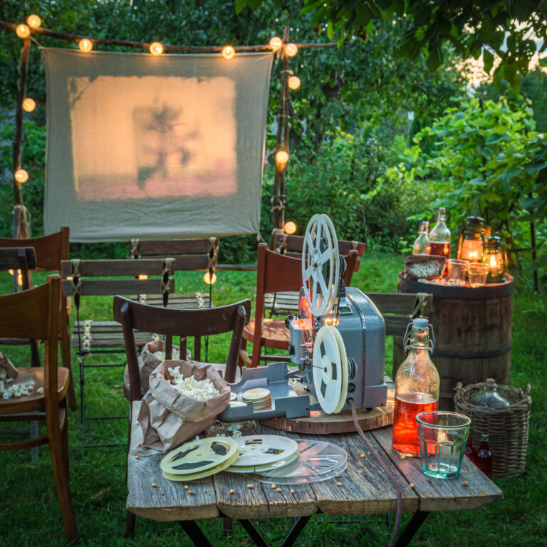 cinema plein air cozy summer cinema with vintage projector in the e 2023 11 27 05 14 48 utc1