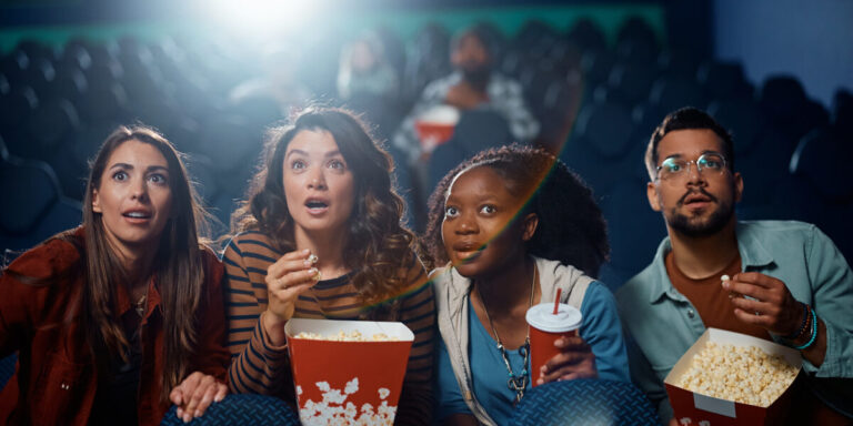 multiracial group of friends watching suspenseful 2023 11 27 05 01 47 utc 1200x6001 1